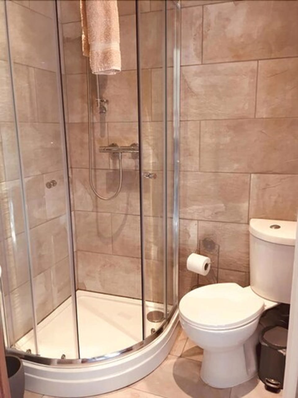 Hair dryer, bathrobes, towels, toilet paper