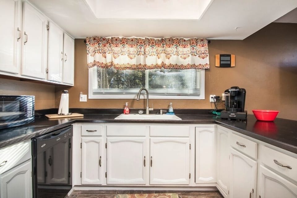 Large open kitchen - a Keurig for coffee and tea, lots of dishes for cooking