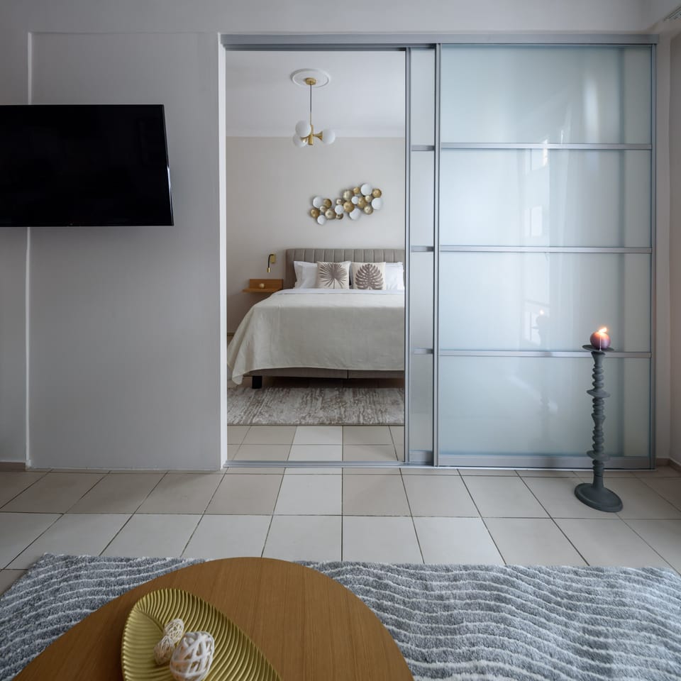 Exclusive Apartment, 1 Bedroom | 1 bedroom, in-room safe, blackout drapes, iron/ironing board