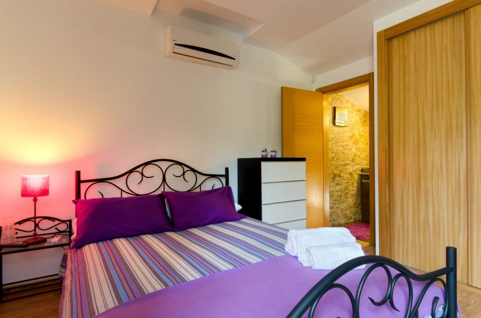 Apartment, 1 Bedroom | Desk, blackout drapes, soundproofing, iron/ironing board