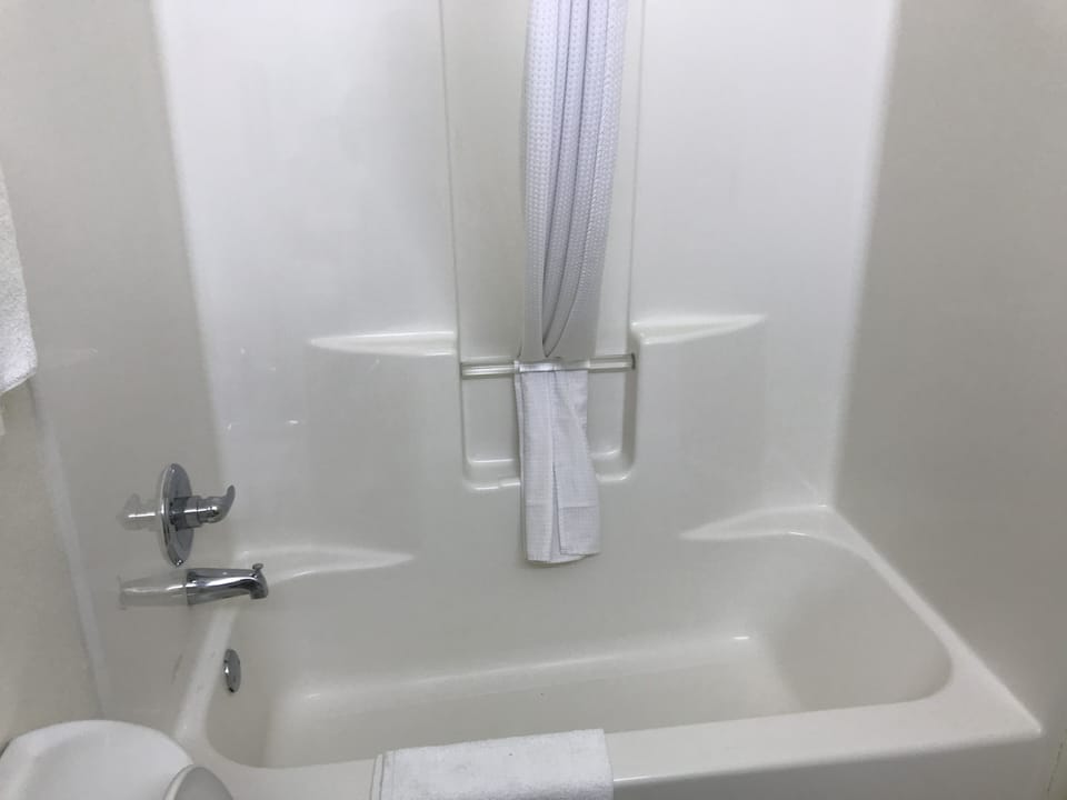 King Sized Room with Kitchenette | Bathroom | Combined shower/tub, hair dryer, towels, soap