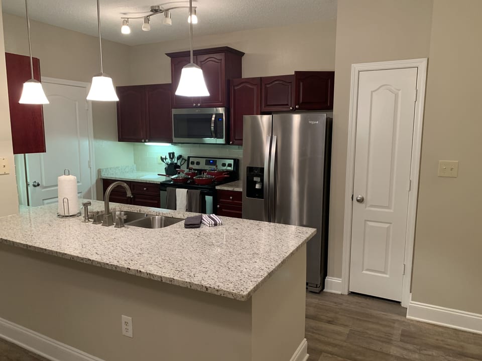 Kitchen with stainless steel appliances .