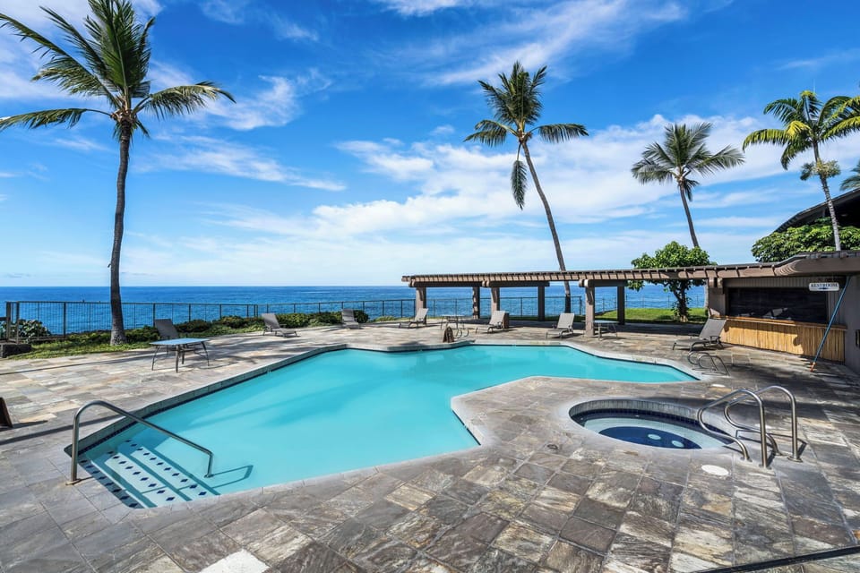 One of the resort pools sits right at the water's edge, hot tub included.