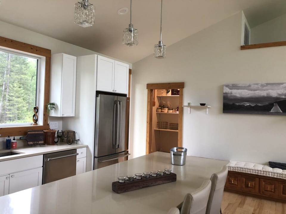 Kitchen view towards pantry 