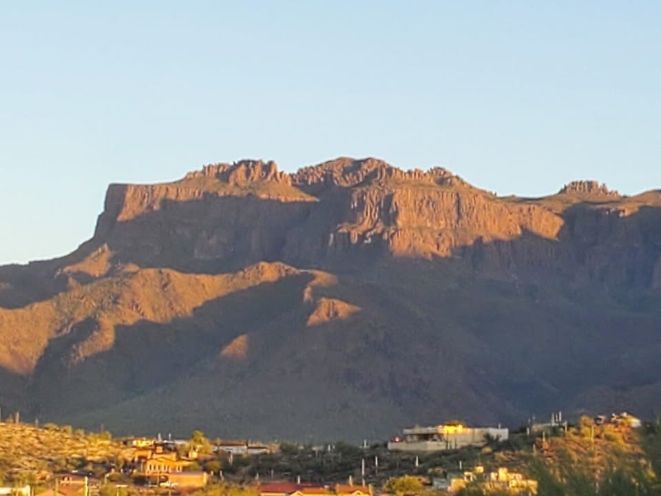 The imposing Superstition Mountains are your backdrop