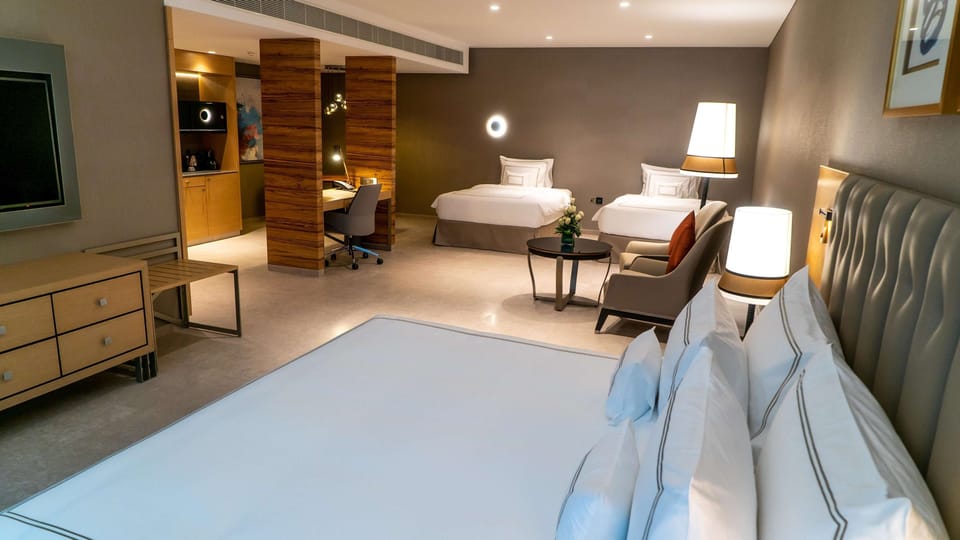 Grand Family Room - Complimentary Luxury Transfers to Jumeirah Beach and Mall of Emirates | Premium bedding, minibar, in-room safe, desk