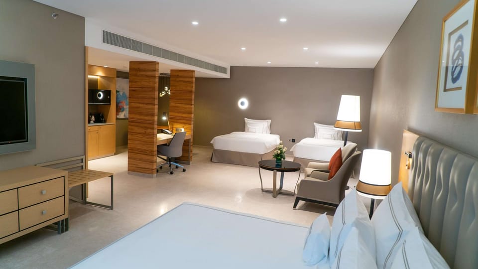 Grand Family Room - Complimentary Luxury Transfers to Jumeirah Beach and Mall of Emirates | Premium bedding, minibar, in-room safe, desk