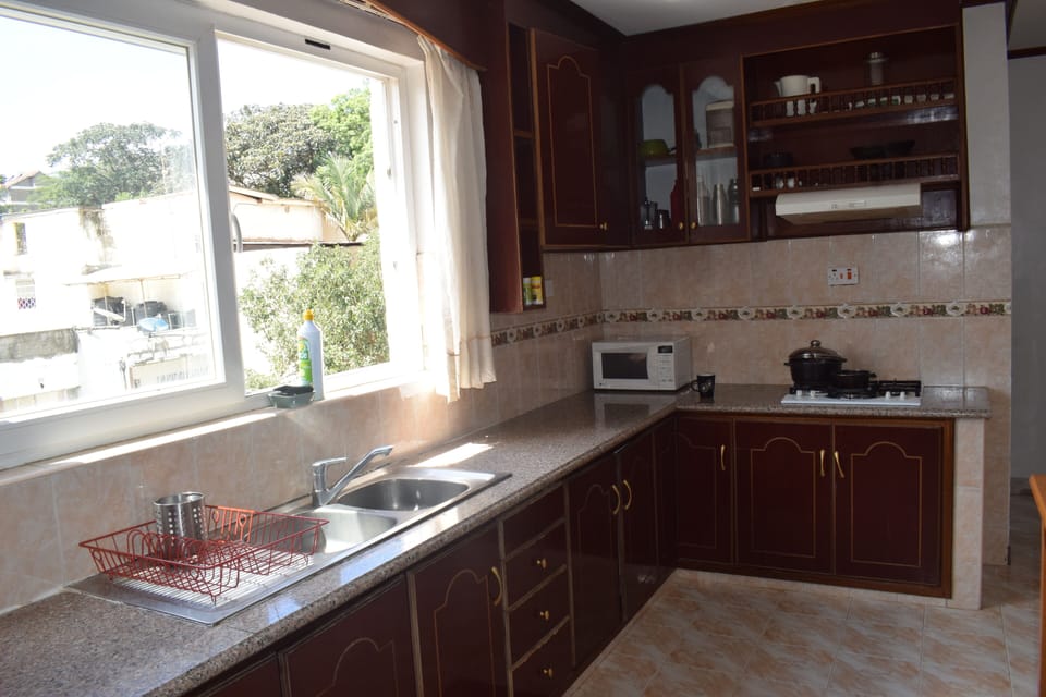 Apartment, 2 Bedrooms | Private kitchen | Fridge, microwave, oven, stovetop