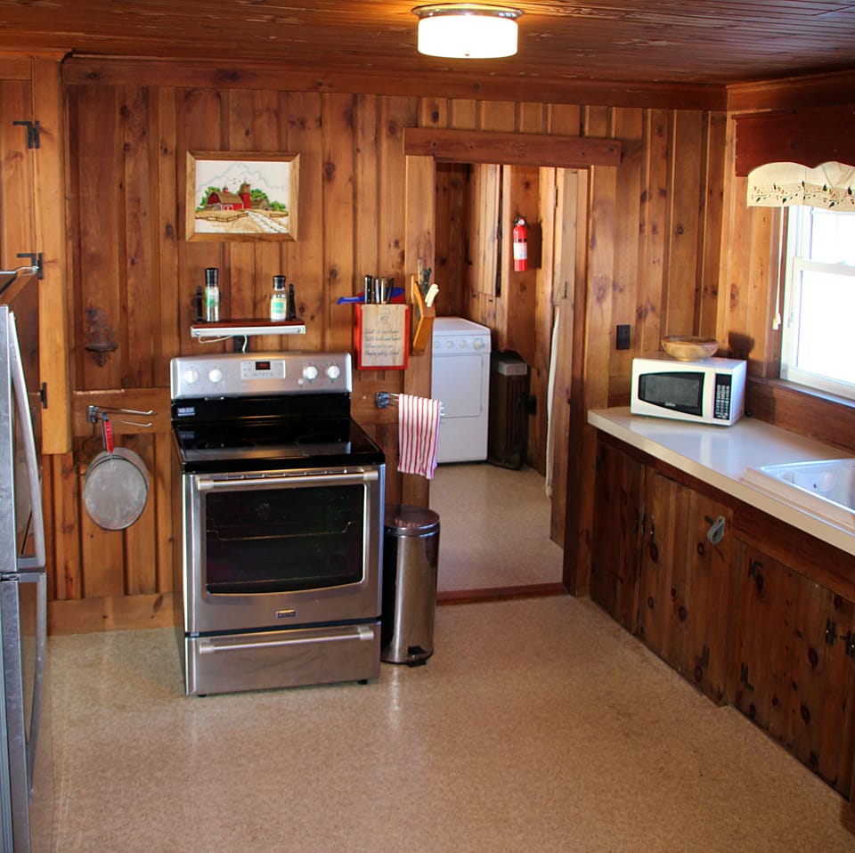 The Kitchen is right off from the dining room. Washer/Dryer opposite Kitchen.

