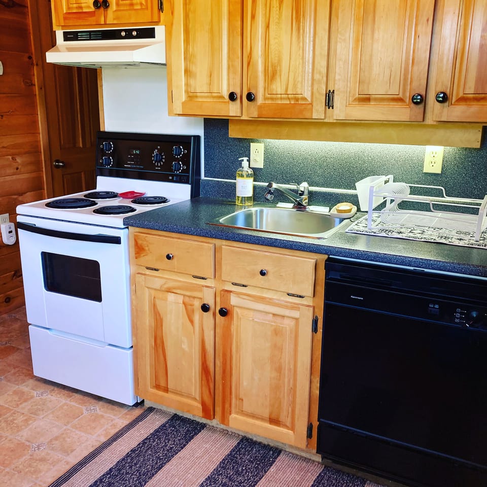 Fully stocked kitchen and dishwasher/microwave. 