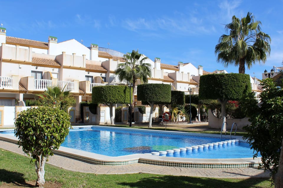 Communal pool just outside of the door!