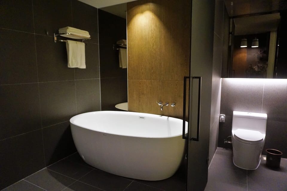 Suite Double Room | Bathroom | Separate tub and shower, hair dryer, bathrobes, towels