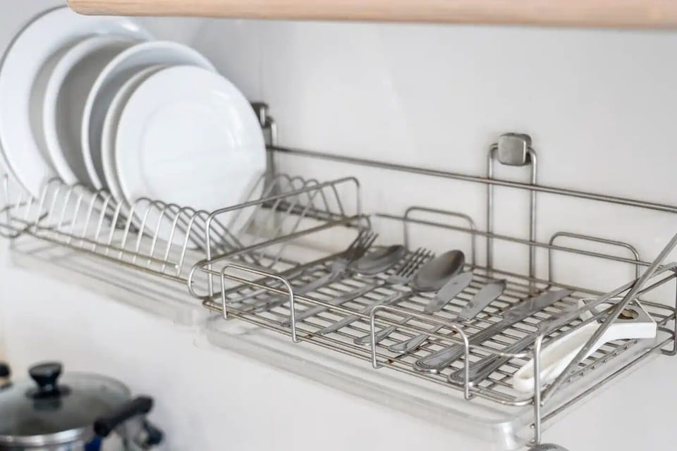 One Bedroom Suite (checkin 8am - 8pm) | Private kitchen | Full-size fridge, microwave, cookware/dishes/utensils