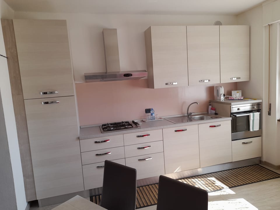 Family Studio, Kitchen, Garden Area | Private kitchen | Highchair, cookware/dishes/utensils, cleaning supplies, paper towels