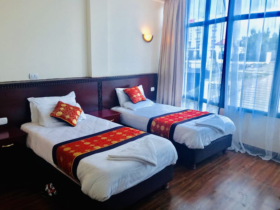 Basic Twin Room | Desk, laptop workspace, blackout drapes, free WiFi