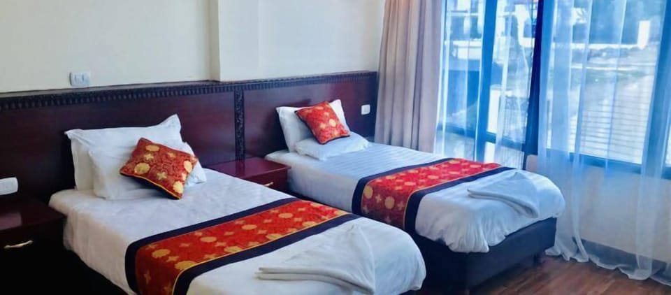 Basic Twin Room | Desk, laptop workspace, blackout drapes, free WiFi