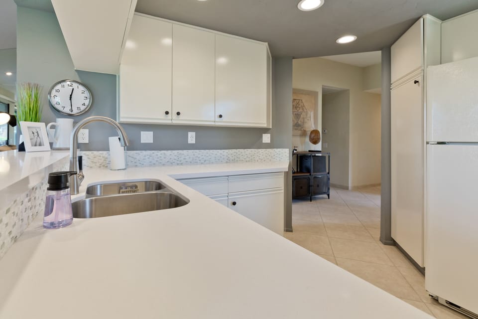Kitchen with crockpot, blender, keurig coffee, toaster, and all baking needs