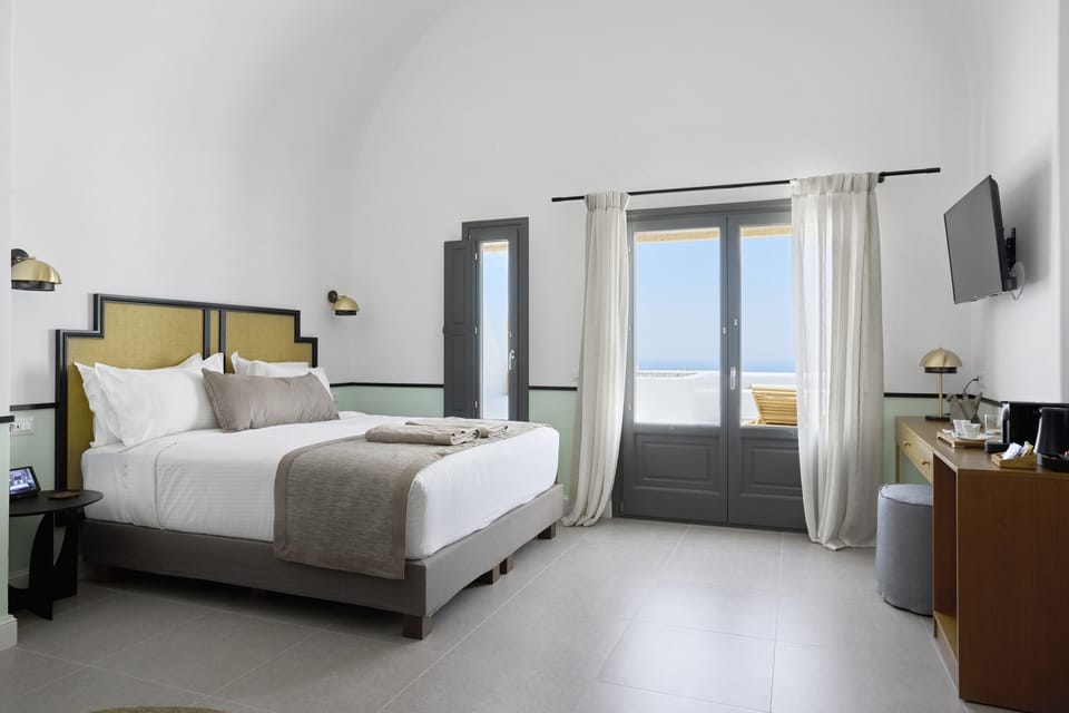 Honeymoon Suite, Sea View (Heated Plunge Pool) | Minibar, in-room safe, desk, laptop workspace