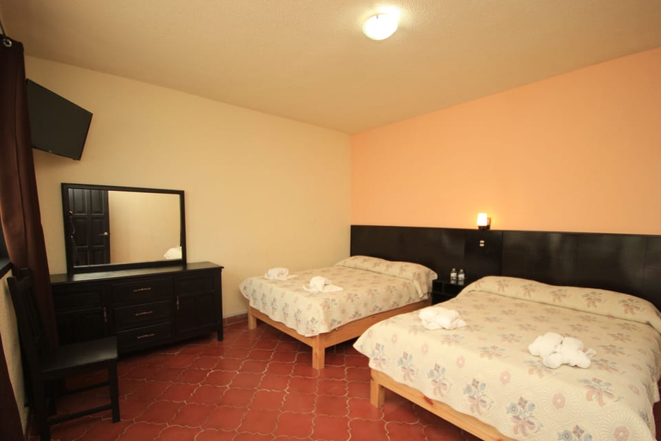 Standard Quadruple Room, 2 Double Beds | Iron/ironing board (on request), WiFi (free), bed sheets