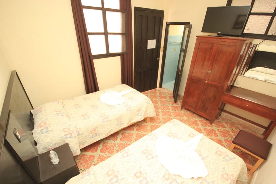 Standard Room, 2 Twin Beds | Iron/ironing board (on request), WiFi (free), bed sheets