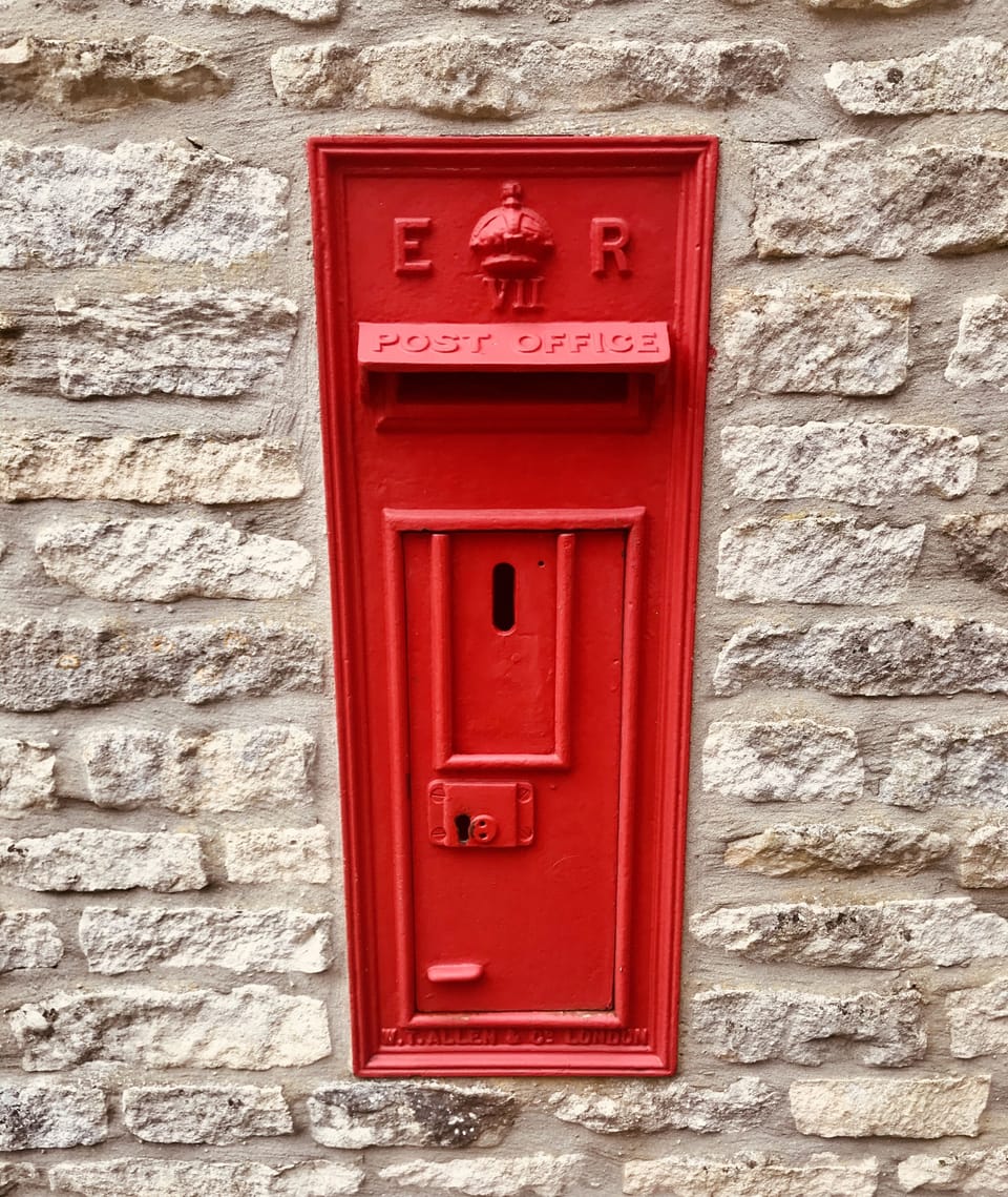 The Old Post Office to the left of the front door. 