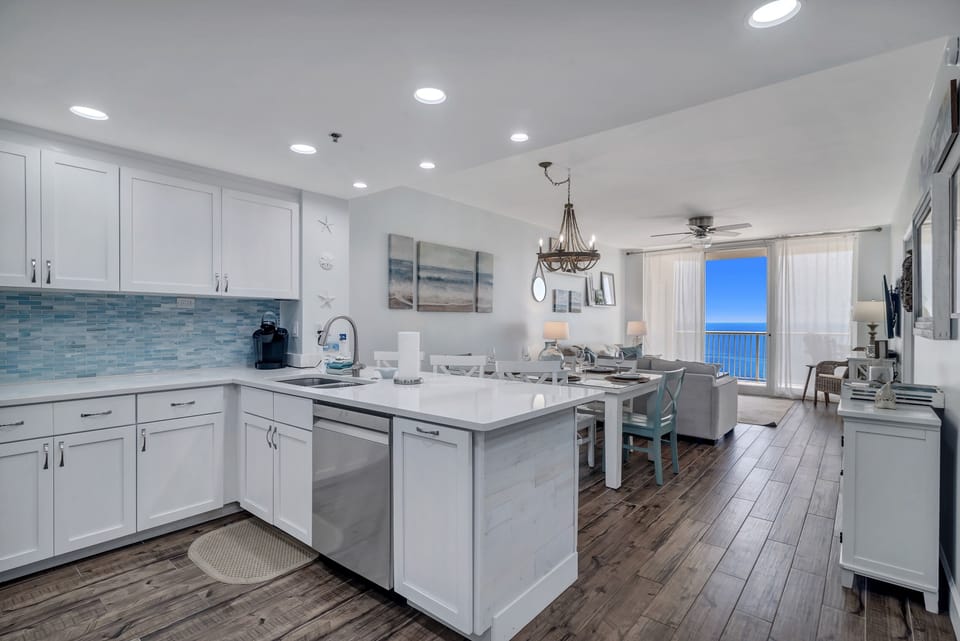 Bright and airy kitchen with ample counter space and modern amenities, creating an inviting space for cooking and gathering.