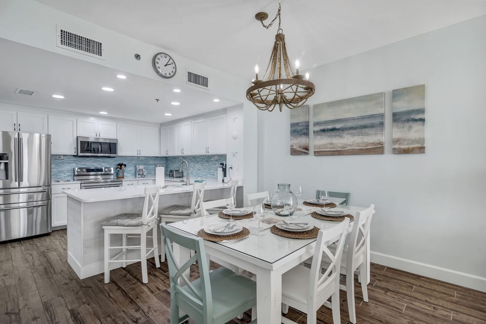 Coastal elegance meets relaxed dining in this inviting space.