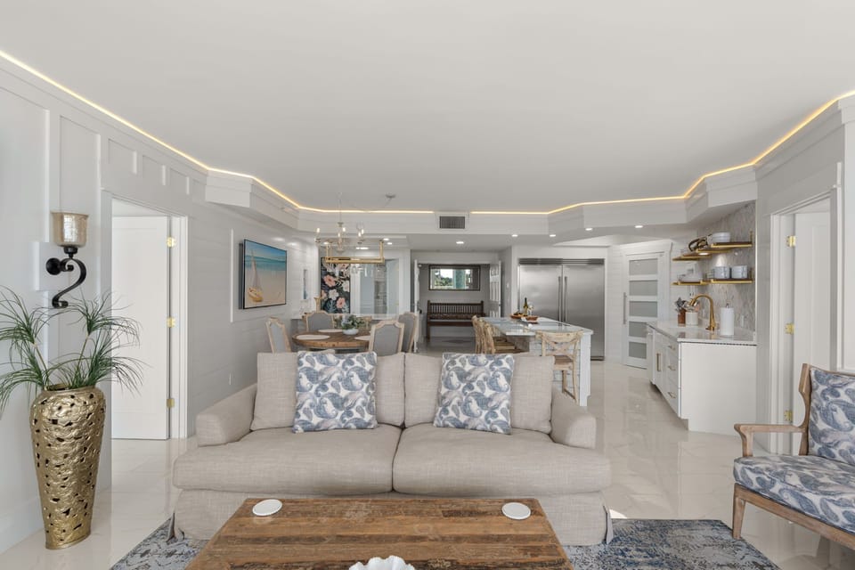 Your spacious open-plan living area flows seamlessly into a gourmet kitchen, perfect for gathering and creating memories together.