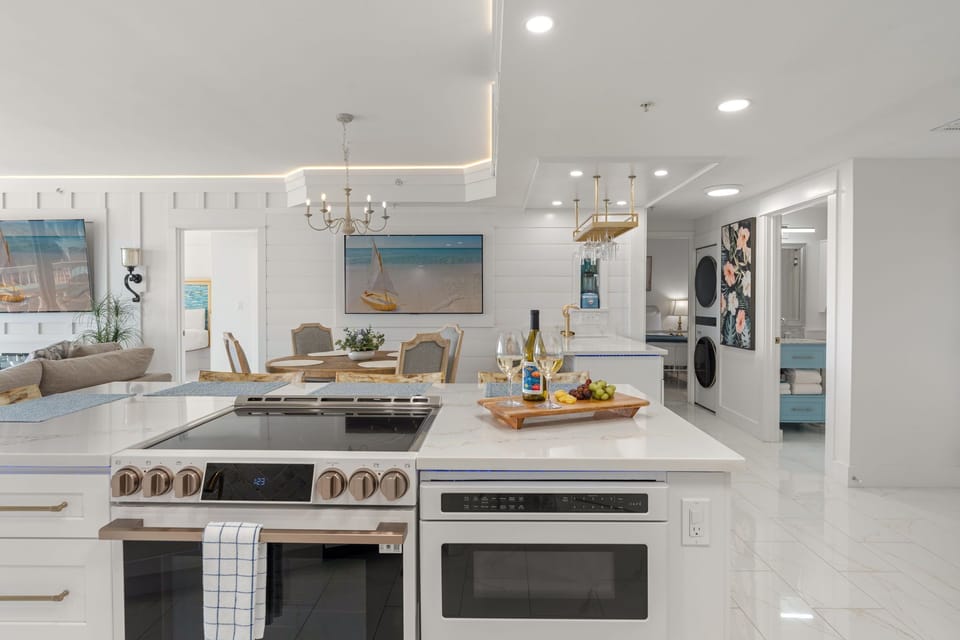 Step into your gourmet kitchen where marble countertops and premium appliances invite you to create culinary masterpieces.