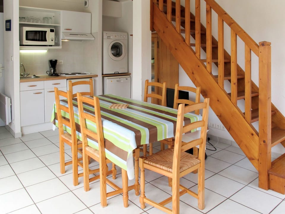 Furniture, Room, Property, Stairs, Table, Floor, Building, Interior Design, Chair, Handrail