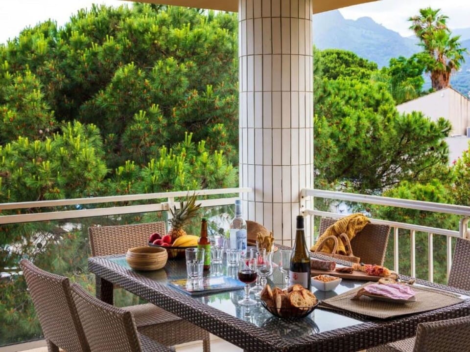 Furniture, Chair, Table, Outdoor Furniture, Kitchen & Dining Room Table, Outdoor Table, Interior Design, Restaurant, Porch, Shade