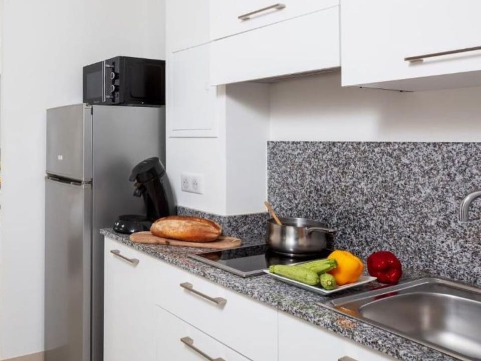 Kitchen, Countertop, Kitchen Appliance, Major Appliance, Interior Design, Flooring, Cabinetry, Kitchen Stove, Floor, Home