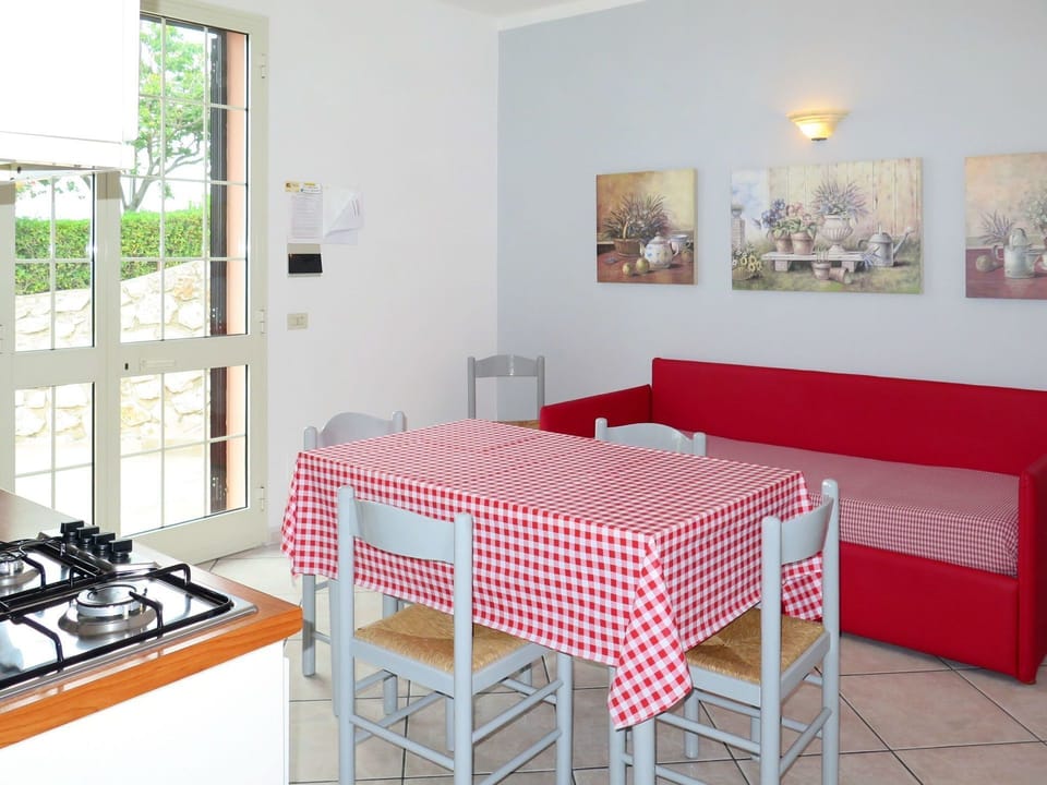 Furniture, Room, Property, Red, Table, Interior Design, Yellow, Floor, Pink, House