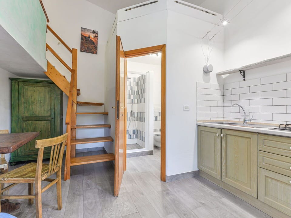 Building, Furniture, Cabinetry, Property, Wood, Lighting, Interior Design, Flooring, Door