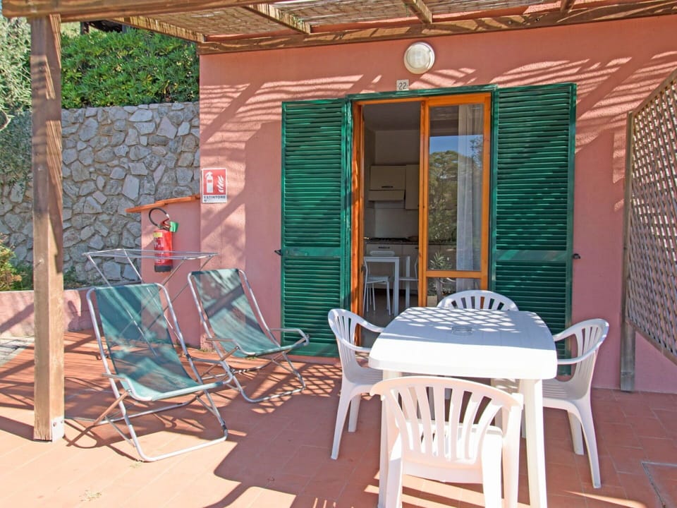 Furniture, Property, Building, Window, Chair, Wood, Shade, Orange, Table, Outdoor Furniture