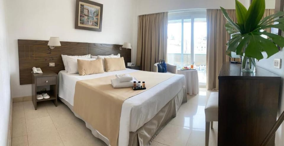Deluxe Double Room | Premium bedding, in-room safe, desk, iron/ironing board