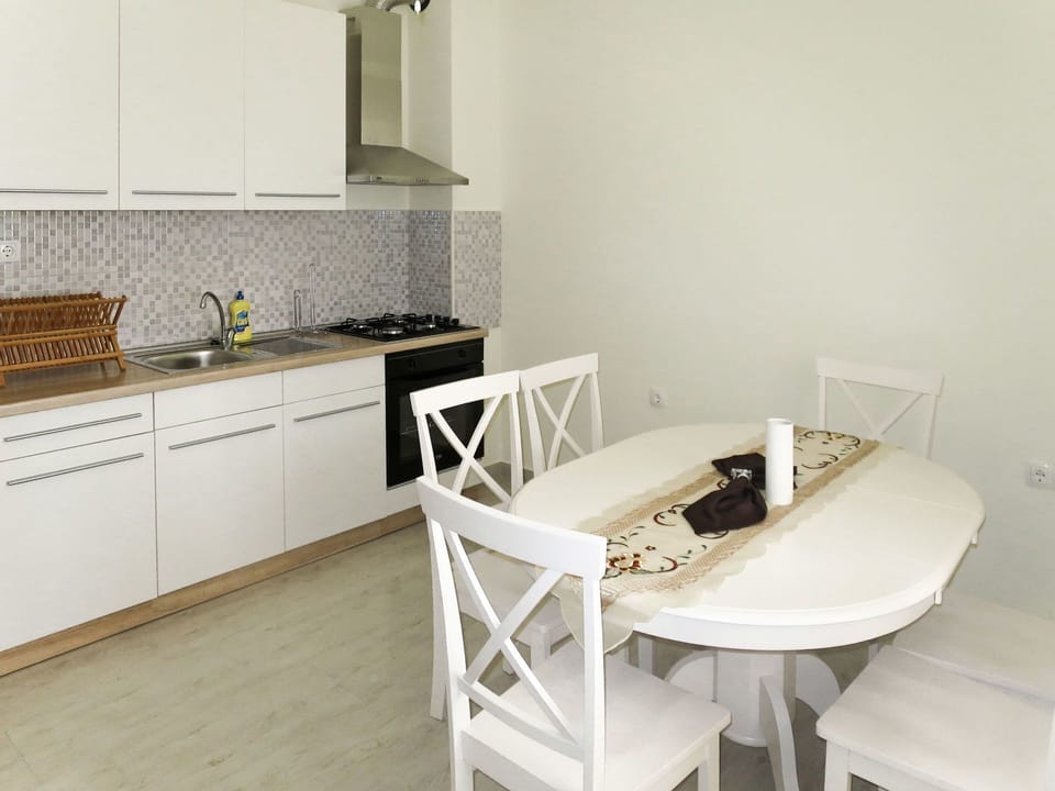 Room, Property, White, Furniture, Countertop, Floor, Kitchen, Interior Design, Tile, House