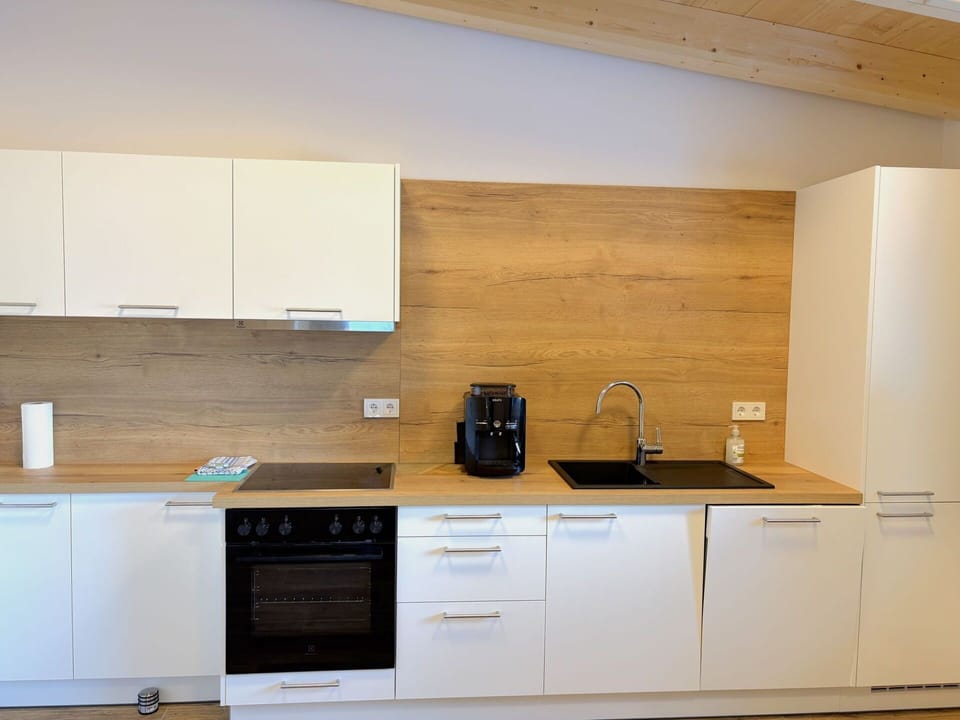 Flooring, Countertop, Kitchen, Interior Design, Wood, Cabinetry, Furniture, Floor, Kitchen Appliance, Home