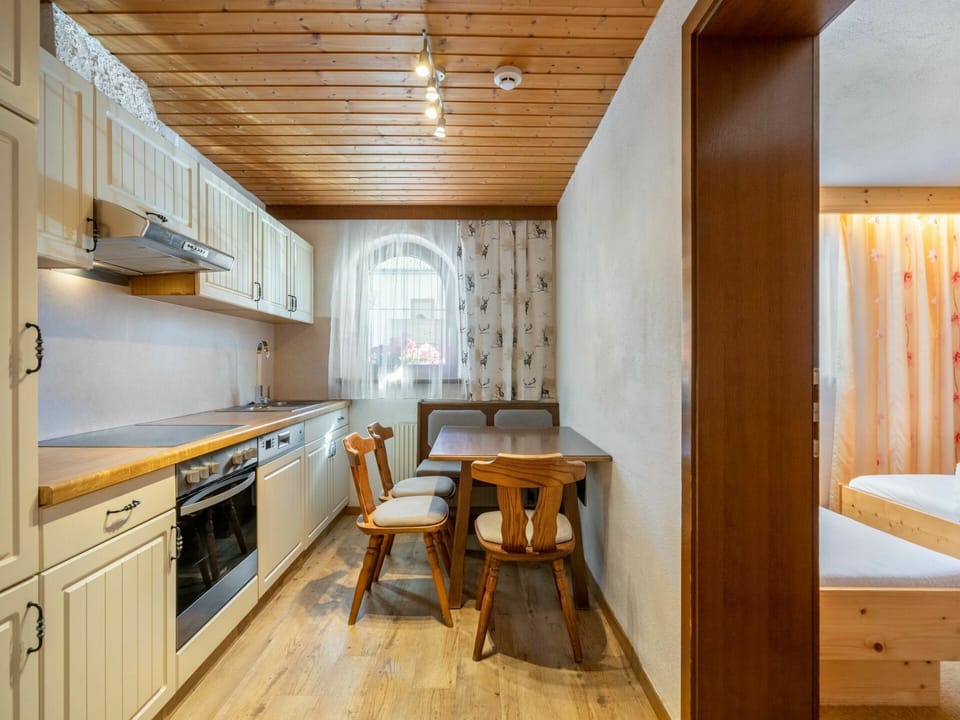 Furniture, Cabinetry, Table, Wood, Countertop, Interior Design, Drawer, Flooring, Chair, Floor