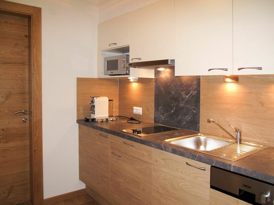 Brown, Cabinetry, Tap, Building, Kitchen Sink, Countertop, Sink, Plumbing Fixture, Kitchen Stove, Kitchen