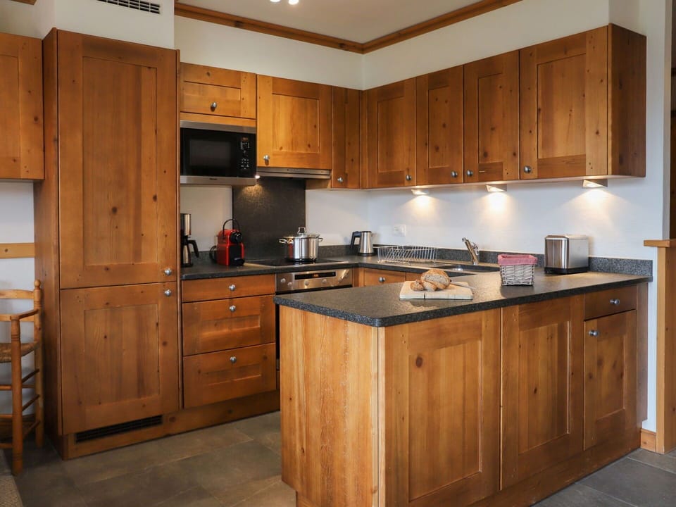 Countertop, Cabinetry, Furniture, Kitchen, Kitchen Appliance, Home Appliance, Wood, Drawer, Building, Architecture