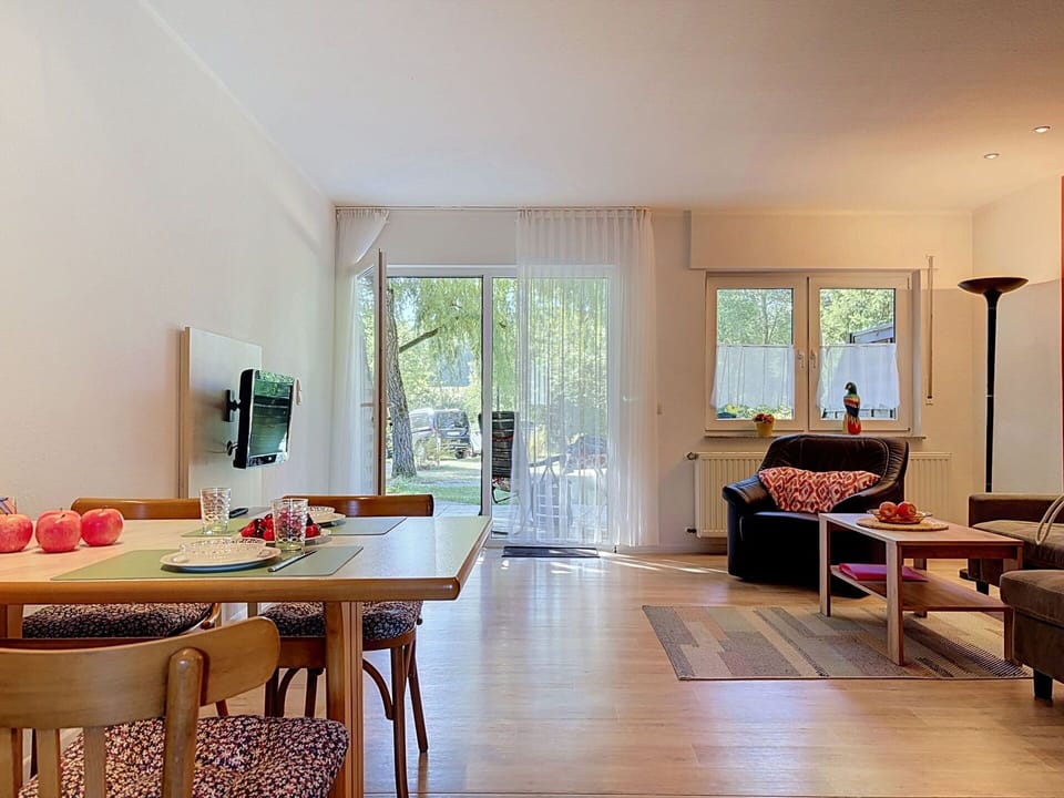 Furniture, Interior Design, Flooring, Floor, Wood, Ceiling, Room, Lighting, Table, Chair