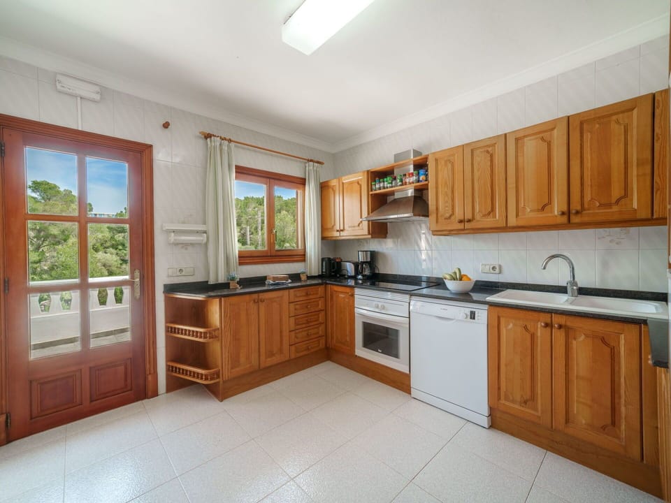 Kitchen, Cabinetry, Furniture, Flooring, Kitchen Appliance, Interior Design, Wood, Countertop, Major Appliance, Ceiling