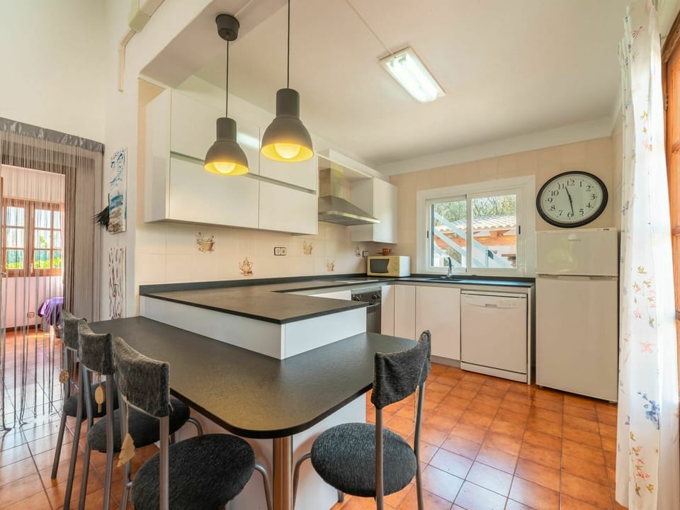 Furniture, Table, Property, Cabinetry, Window, Countertop, Chair, Lighting, Wood, Interior Design