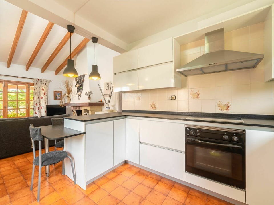 Cabinetry, Countertop, Furniture, Kitchen Stove, Kitchen Appliance, Kitchen, Wood, Home Appliance, Building, Lighting