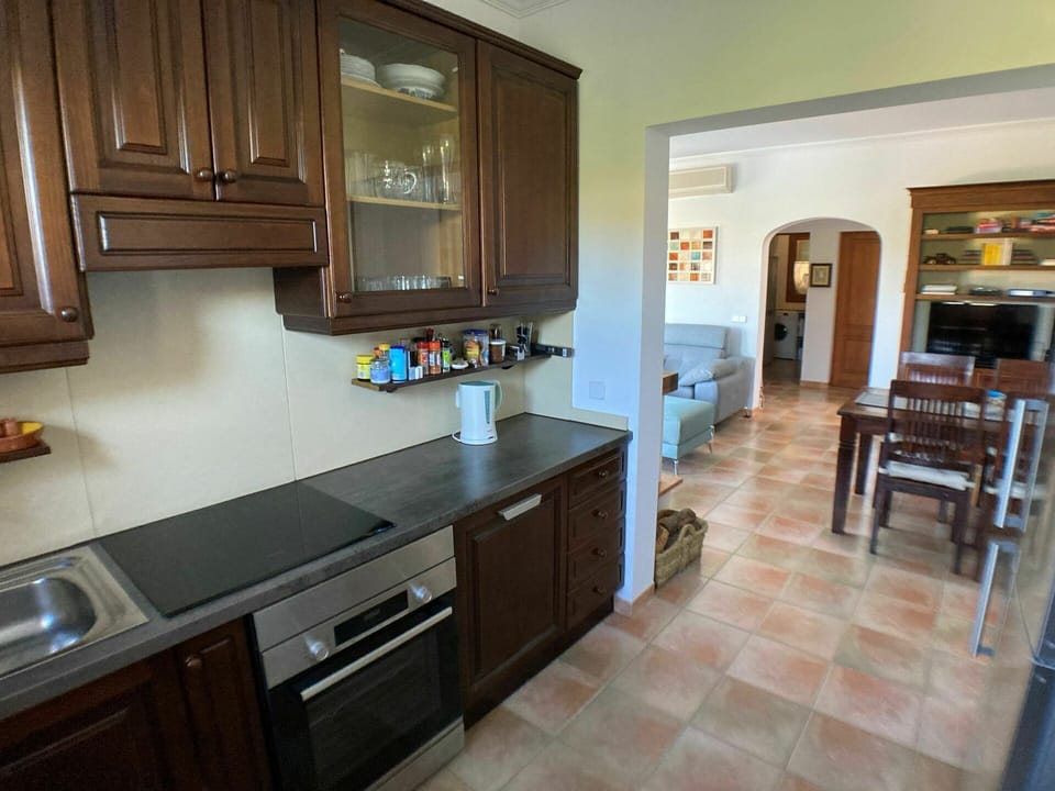 Countertop, Property, Room, Furniture, Cabinetry, Kitchen, Building, Floor, Interior Design, Tile