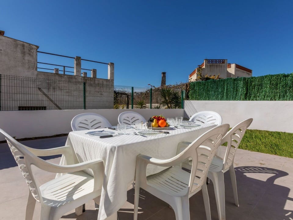 Furniture, Floor, Chair, Outdoor Furniture, Kitchen & Dining Room Table, Outdoor Table, Tile, Houseplant, Coffee Table, Balcony