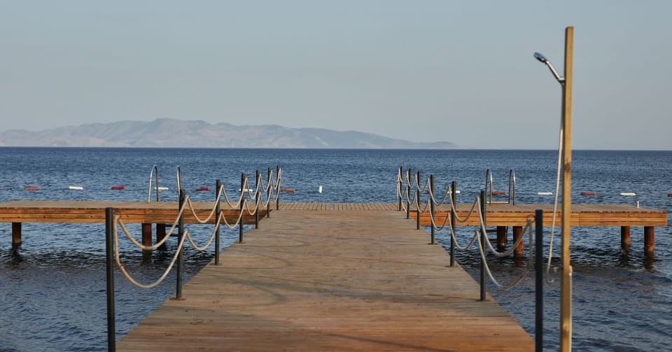 Private beach, white sand, free beach cabanas, sun loungers