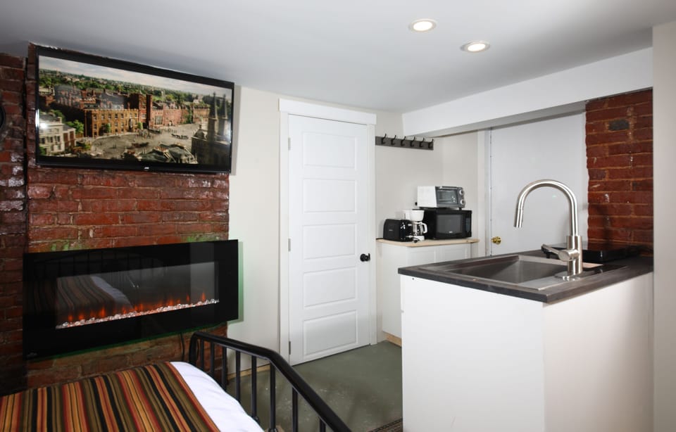 J HAMILTON GRAY  SUITE 10 (basement unit) 2 Beds, Fireplace | Bathroom | Shower, hydromassage showerhead, eco-friendly toiletries, hair dryer