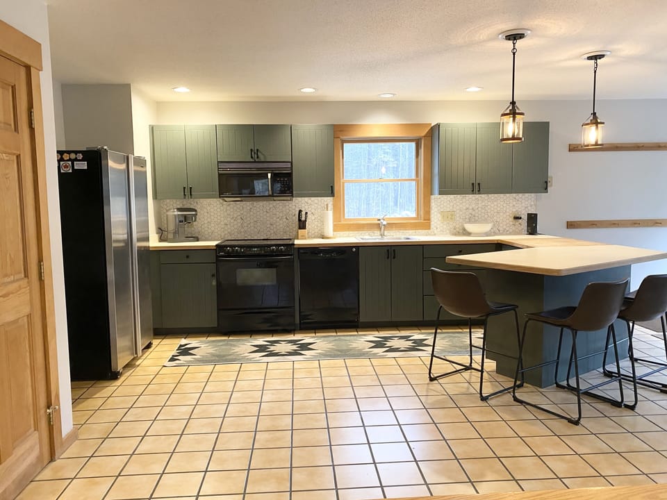 Open kitchen - well stocked.